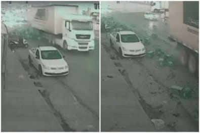 Câmera flagra momento que caminhão tomba e perde carga de cerveja em rodovia de VG